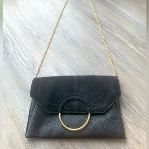 Leather and suede clutch